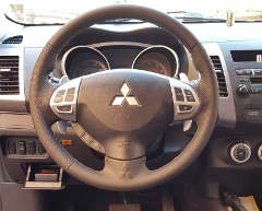 Mitsubishi Outlander II - Lochleder